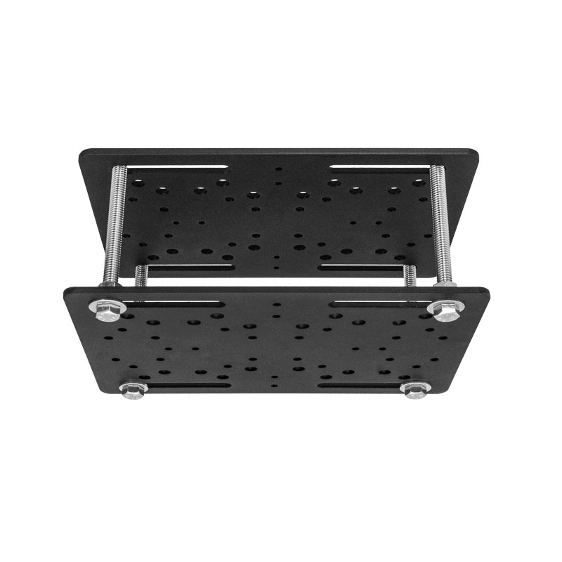 The Forklift Overhead Guard Mount is a black metal unit with two heavy-duty steel plates joined by four threaded rods and nuts, plus multiple holes and slots for adjustable assembly on warehouse vehicles.