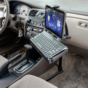 The Heavy-Duty Car Seat Rail Tablet Mount with Keyboard Tray Combo creates a convenient mobile workstation beside the driver, with an adjustable tablet holder above and a keyboard tray below the center console.