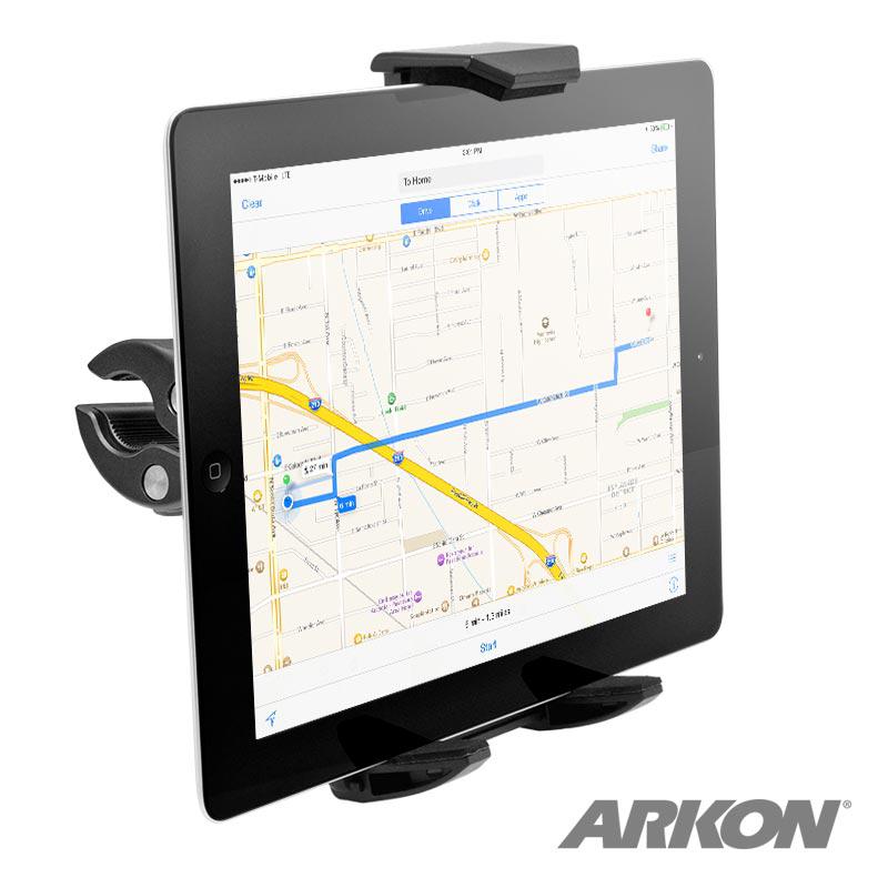 An iPad is securely held in the Heavy-Duty Clamp Post Tablet Mount for iPad, Note, Tab and more, displaying a digital map with a route. The sturdy black holder grips the device, featuring the ARKON logo at the bottom right corner.