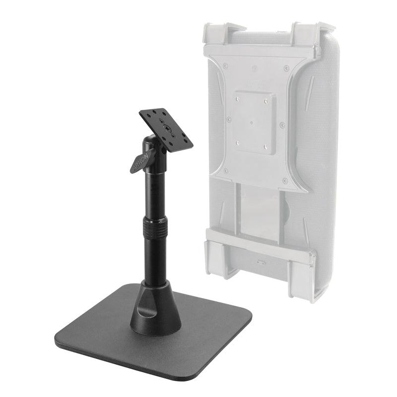 The Heavy-Duty Pedestal Stand with Weighted Base and Telescoping Arm (4-Hole AMPS Compatible) is shown alongside a white wall-mount or protective enclosure, ideal for securely holding a tablet or display device.