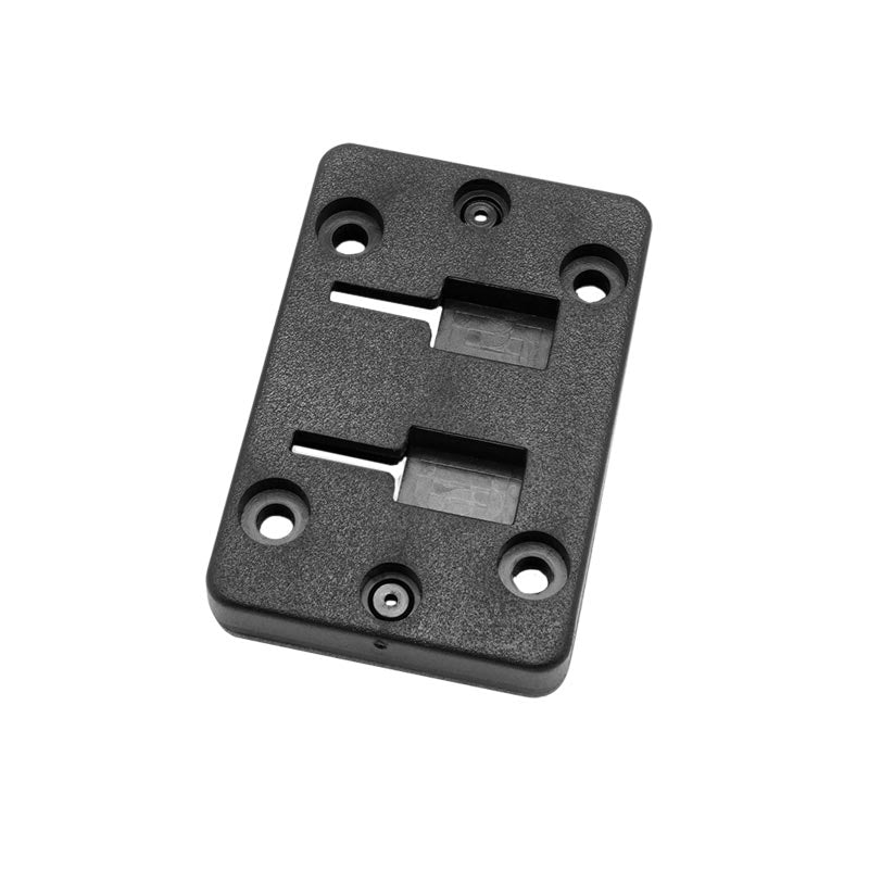 The Horizontal Female Dual T-Slot to 4-Hole AMPS Adapter is a rectangular black plastic plate with four corner screw holes, two central slots, and a bottom-edge hole for attaching components or vehicle-specific mounts.