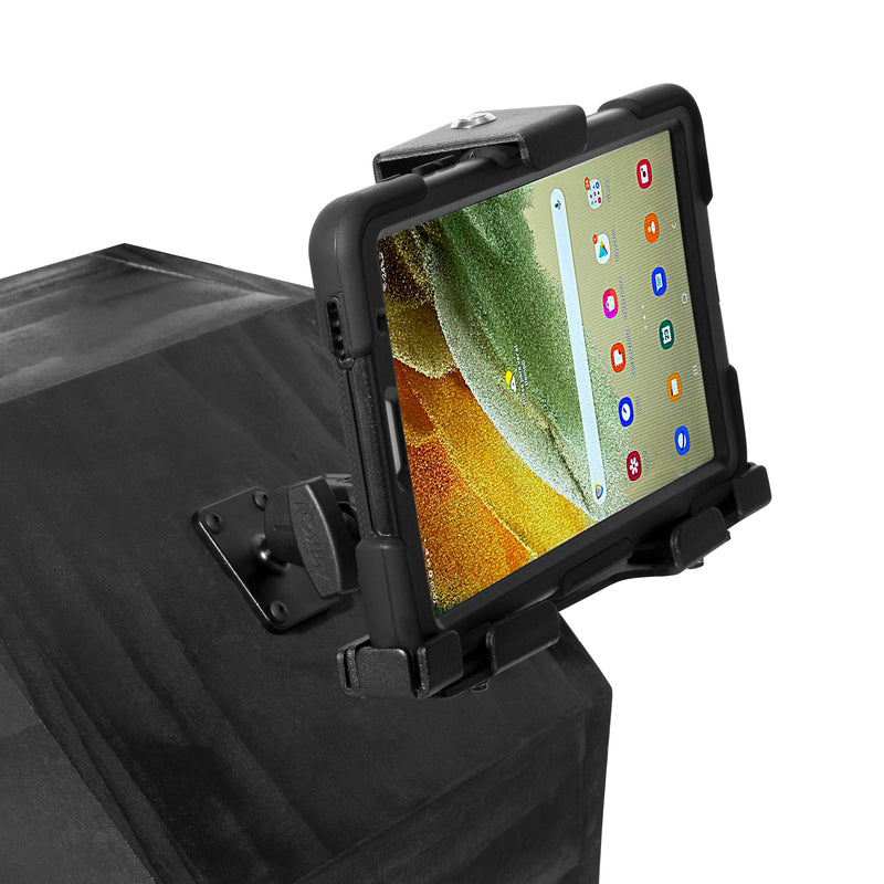 A LockVise™ Locking Tablet Mount with Case & USB Charger securely holds a Samsung Galaxy Tab A7 Lite on a dark surface, displaying colorful app icons on a green and yellow background.