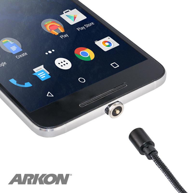 A smartphone with a Magnetic USB to USB Type-C Charge Cable partially connected to its charging port, app icons visible on the screen. The ARKON logo appears in the bottom left corner.