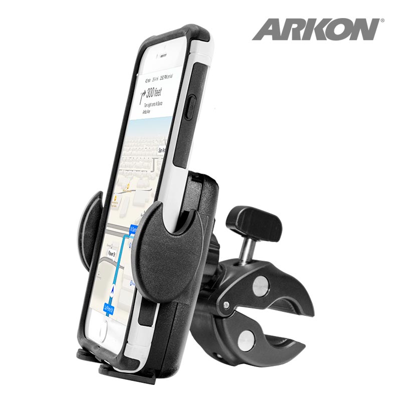The Mega Grip™ Phone Holder with Clamp Mount, shown in black and silver, securely grips a smartphone displaying a map. It features a clamp for attaching to handlebars or similar surfaces, with the Arkon logo visible in the top right corner.