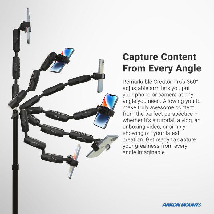 A 360° adjustable arm on the Remarkable Creator™ Pro Mount holds a phone and camera, showing multiple viewing angles for versatile content capture. Arkon Mounts logo appears in the corner.