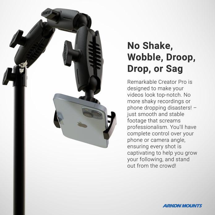 A sturdy phone mount secures a smartphone in landscape orientation. Text on the right promotes the Remarkable Creator™ Pro+Plus Mount w/Ring Light, highlighting its stability and control for content creation and pro video recording.