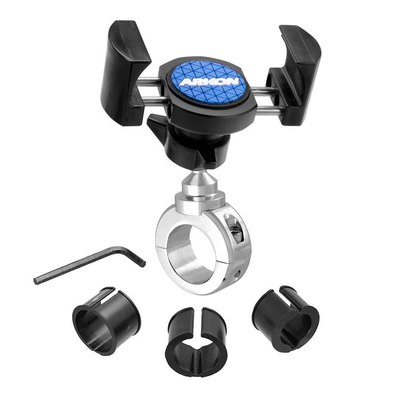 The RoadVise® Holder with Chrome Aluminum Mount is a black and silver bicycle handlebar phone mount, including a hex key and four plastic inserts for secure attachment, displayed on a white background.