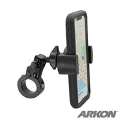 The RoadVise® Premium Aluminum Motorcycle Handlebar Phone Mount secures a smartphone showing a map to a cylindrical bar, with the ARKON logo visible in the bottom right corner.