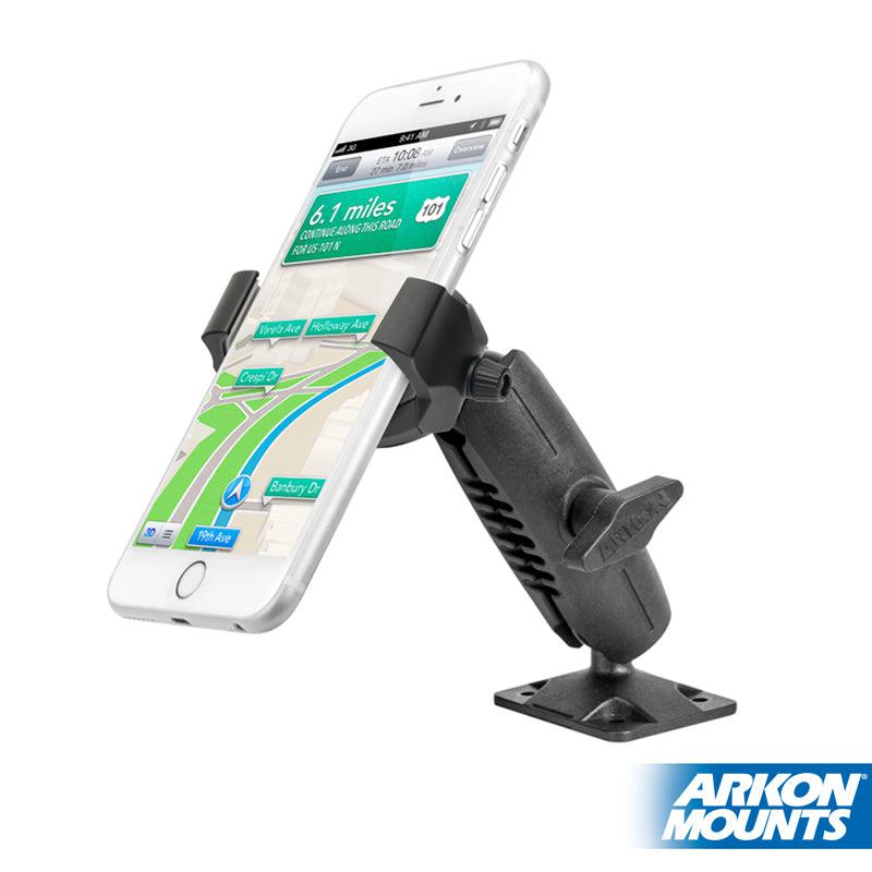 A smartphone with a navigation app is secured in the black RoadVise® Ultra 4-Hole AMPS Drill-Base Phone or Tablet Mount. The Arkon Mounts logo appears at the bottom right.