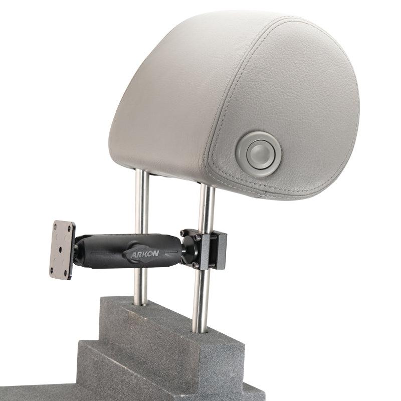 The Robust Car Headrest Mount Pedestal with 4-Hole AMPS Head features an adjustable arm and bracket that attaches to car headrest posts, securely holding any AMPS-compatible device for rear seat passengers.