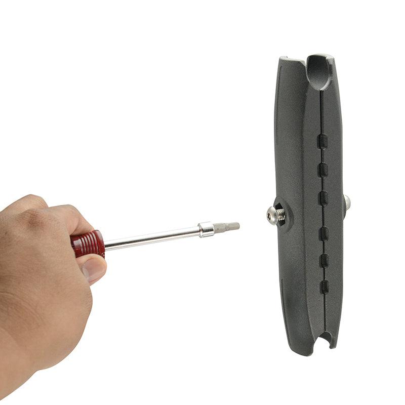A hand tightens a screw with a screwdriver on Security Hardware for 38mm Ball Compatible Robust Shaft Arms against a white background.