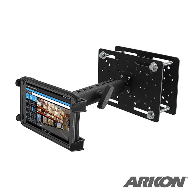 The Slim-Grip® Tablet Holder with Forklift Overhead Guard Mount and 8.5 Metal Shaft features a rugged black metal arm holding a tablet with a photo grid, making it an ideal warehouse tablet holder. The ARKON logo is in the bottom right corner.