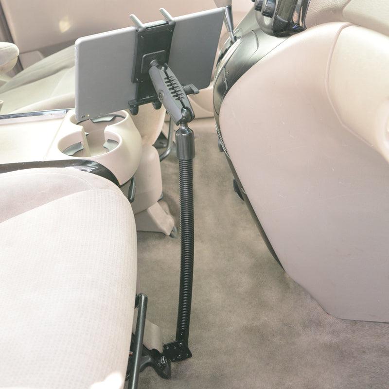 The Slim-Grip® Ultra Phone or Midsize Tablet Seat Rail Mount features a flexible, adjustable arm mounted between front seats for rear passenger hands-free use in beige cars with cup holders, carpeted floor, and a heavy-duty seat rail mount for stability.