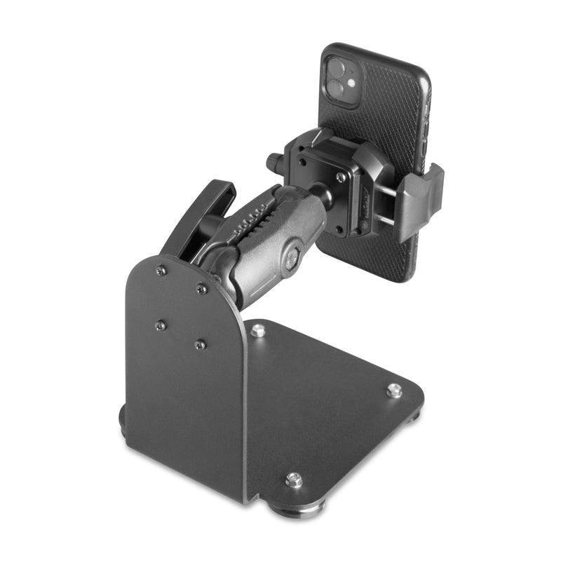The SteadyMag™ Magnetic Mount System with RoadVise® Ultra Phone Holder offers a black metal adjustable desk mount with a sturdy base and pivoting arm, securely gripping your smartphone in landscape mode.