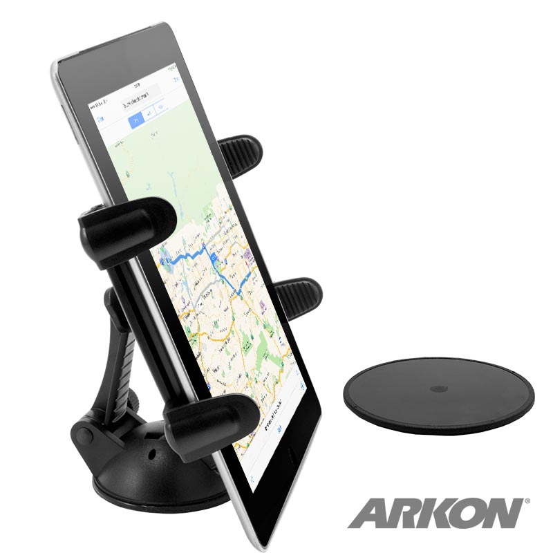 An iPad is held upright in the Sticky Suction Windshield or Dash Slim-Grip® Tablet Mount with adjustable grips; a round adhesive disc lies beside it. The ARKON logo appears at bottom right—ideal for ELD systems and navigation.