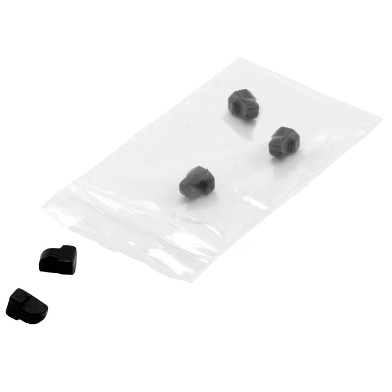 A small transparent bag contains four black, irregularly shaped Support Stoppers for the Slim-Grip® Tablet Holder by Arkon, with two more stoppers placed beside the bag on a white background.