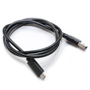 A USB Type A Male to USB Type-C Male Cable, black and coiled neatly on a white background.