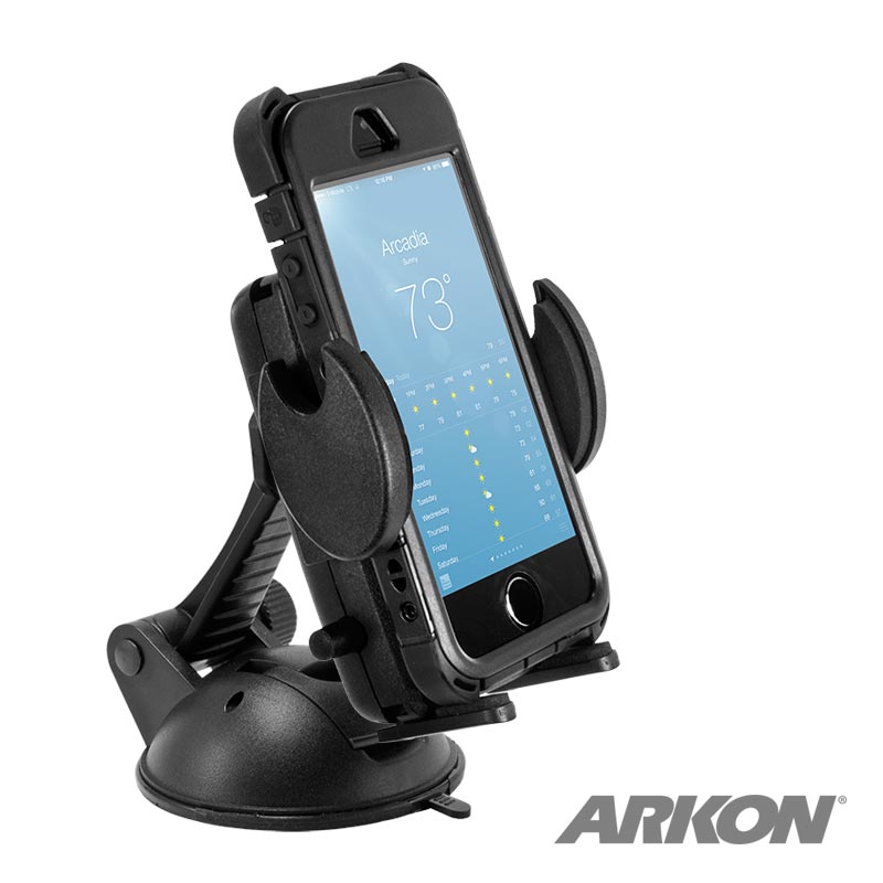 A black Windshield or Dash Car Mega Grip™ Phone Holder Mount secures a smartphone showing a weather app at 73°F in Arcadia. The universal holder, suitable for iPhone, Galaxy, and Note, features the Arkon logo in the bottom right corner.